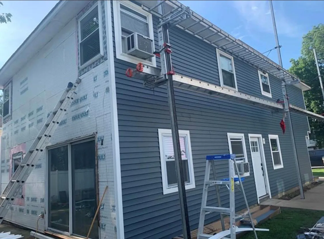 Before and after aluminum siding replacement
